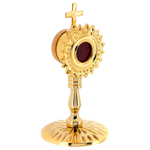 Gold plated brass reliquary of h 5 in, inner diameter of 1.2 in 3