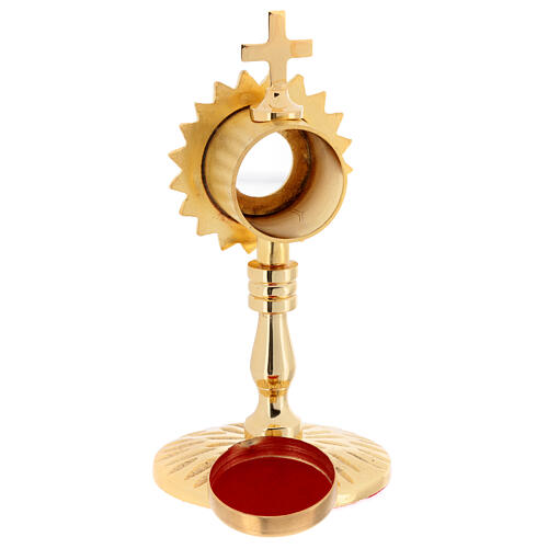 Gold plated brass reliquary of h 5 in, inner diameter of 1.2 in 5