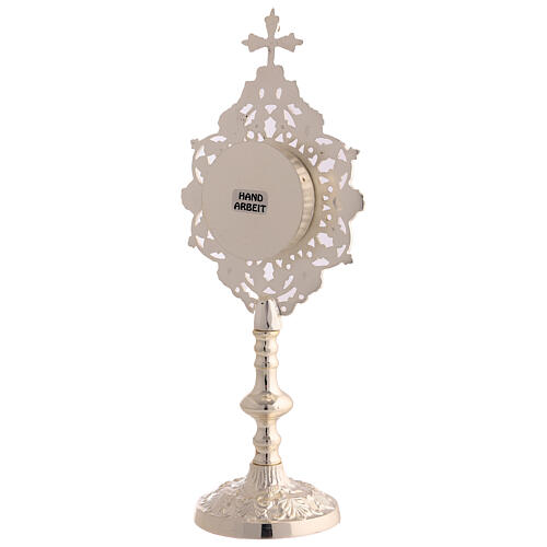 Silver-plated brass reliquary with arabesque rays, 10 in 4