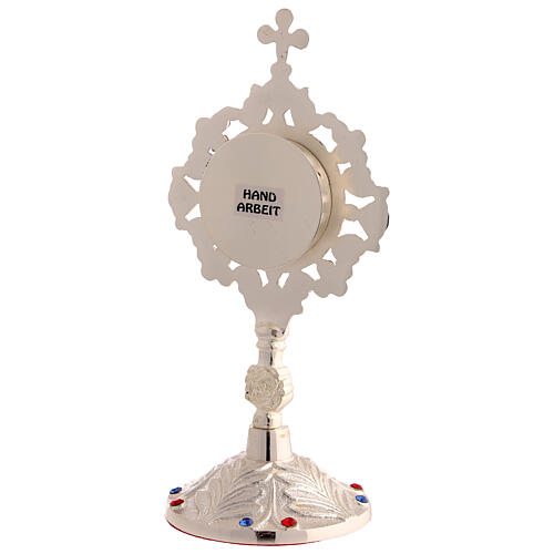 Silver-plated brass reliquary with coloured crystals, 8 in 5