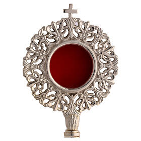 Silver-plated brass reliquary with cut-out intertwined frame, 11 in