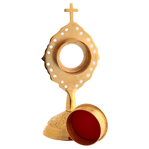 Perforated oval ray reliquary height 14 cm in gold-plated brass 4