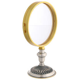 Bicoloured metal reliquary with embossed base, 10 in