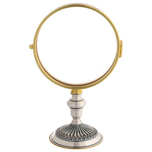 Bicoloured metal reliquary with embossed base, 10 in 1