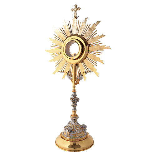 Bicoloured gold and silver cast monstrance with angels, 28 in 7
