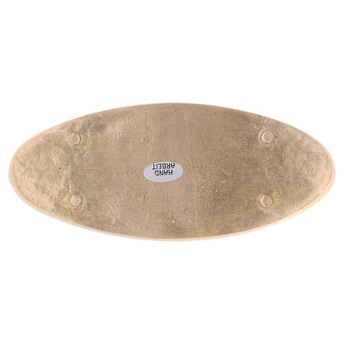 Oval candle holder plate in golden brass with incisions 3