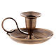 Brass candleholder with handle and plate of 5 cm height s1