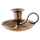 Brass candleholder with handle and plate of 5 cm height s2