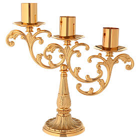 Candlestick in cast brass with 3 flames