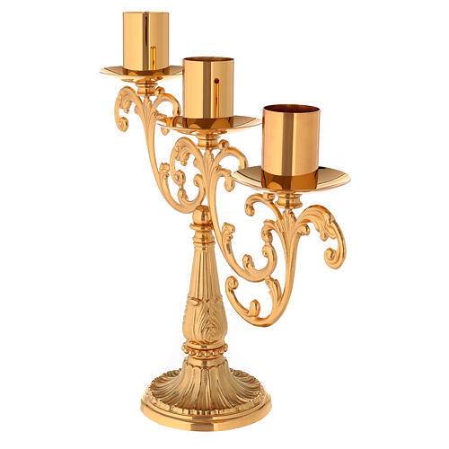 Candlestick in cast brass with 3 flames 3
