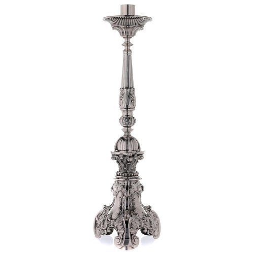 Altar candlestick, late 19th c., brass. Four-piece ornam…