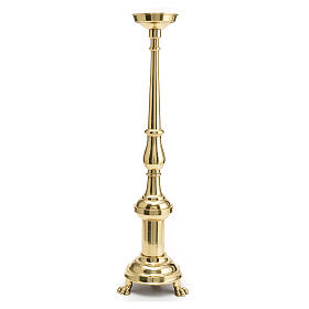 Three-legged candle holder of polished brass, h 24 in