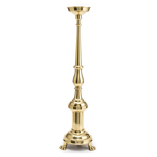 Three-legged candle holder of polished brass, h 24 in 2