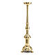 Three-legged candle holder of polished brass, h 24 in s2