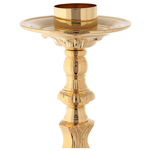 Rococo candlestick of polished brass 2
