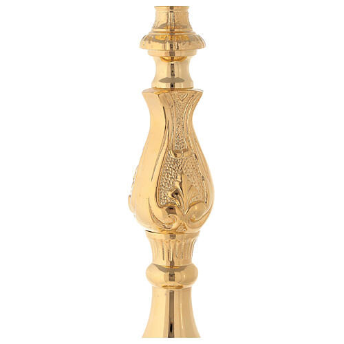 Rococo candlestick of polished brass 4