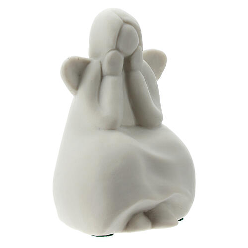 Seated angel 2 1/4 in white porcelain 4