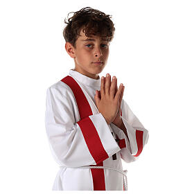 First communion alb decorated with red edges
