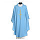 Light blue chasuble in 100% polyester with golden cross s1