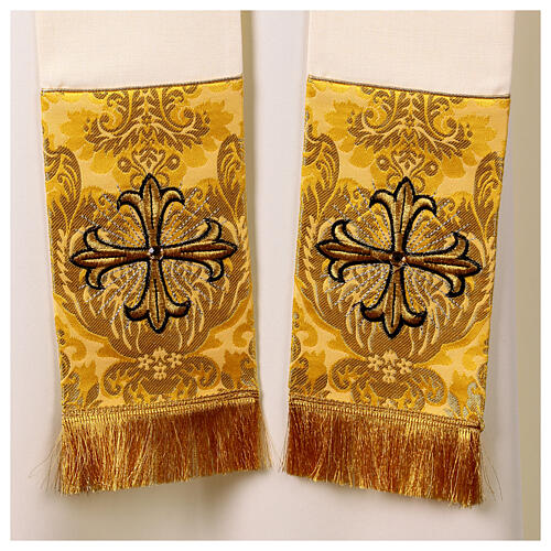 Cope with golden fabric and embroidered crosses, white alb 9