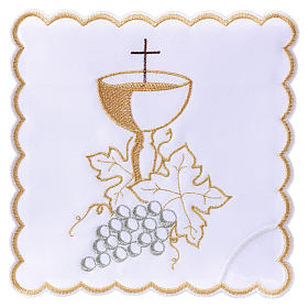 Mass linen white grapes leaves and golden chalices, cotton