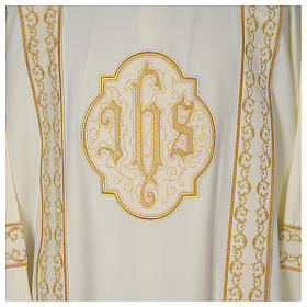 Dalmatic with gold embroidered lateral bands and IHS symbol