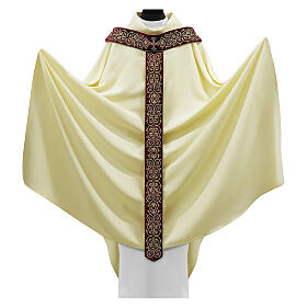 Cream-coloured chasuble with burgundy velvet pallium and golden embroidery