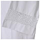 White alb 65% polyester 35% cotton with decoration on the sleeve and lace and crochet partition with zip on the front s4