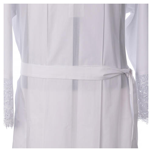White polycotton alb with lateral pleats, macramé lace and golden clasp 9
