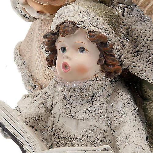 Christmas statue Children singing carols 2