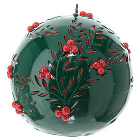 Round green Christmas candle with carved pattern and red berries, 15 cm of diameter