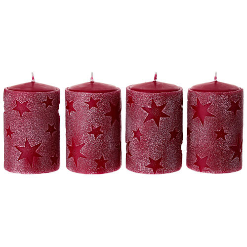 Set 4 candele rosse con stelle in rilievo 10x6 cm 1