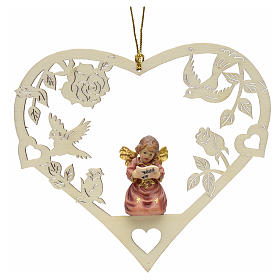 Christmas decor angel with music score on heart