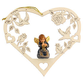 Christmas decor angel with trumpet on heart
