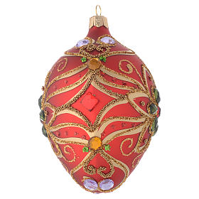 Oval bauble in red blown glass with green flower 130mm