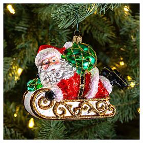 Blown glass Christmas ornament, Santa Claus with sled