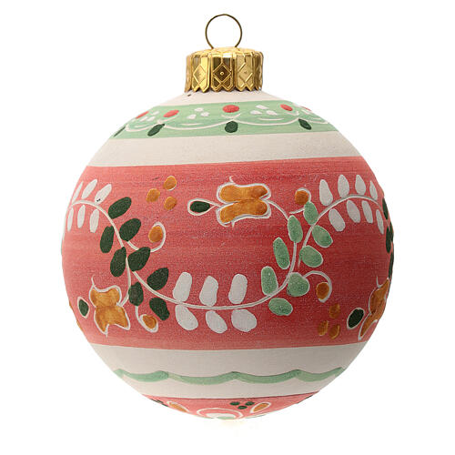 Red round Christmas bauble in terracotta 1