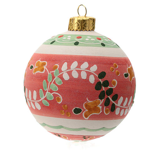 Red round Christmas bauble in terracotta 2