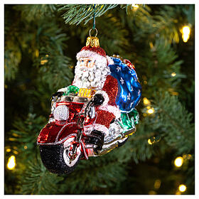 Blown glass Santa Clause on a Motorcycle Christmas ornament