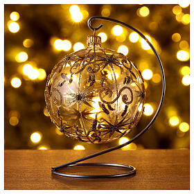 Transparent blown glass Christmas ball with gold decoration and glitter 10 cm