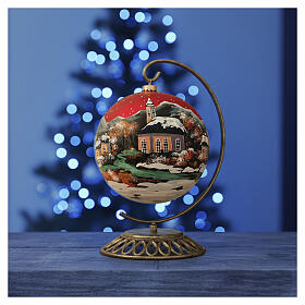 Christmas ball in blown glass 200 mm, nordic village under red sky