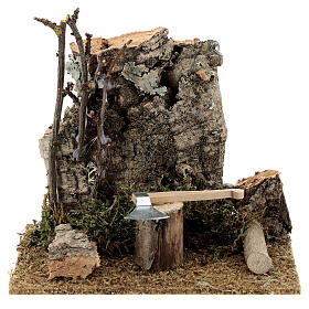 Nativity set setting, hatchet with logs