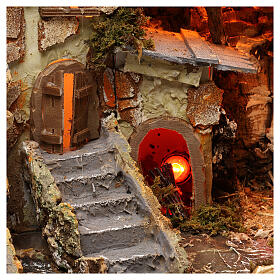 Cabaña pesebre ambiente ciudad luz y fuego