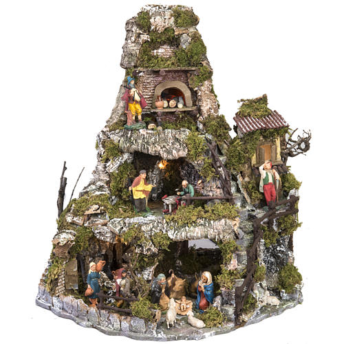 Nativity village Neapolitan style with stable, lights and fire 1