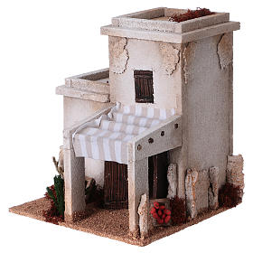 Casa araba con bottega frutta