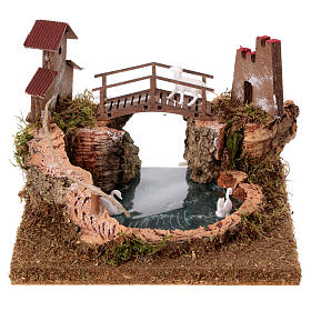 Nativity setting, mountain lake with bridge and animals