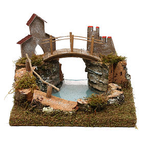 Nativity setting, mountain lake with bridge and animals