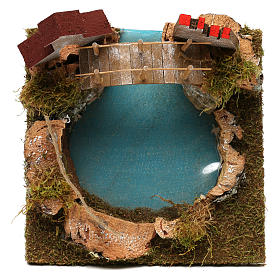 Nativity setting, mountain lake with bridge and animals