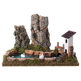 Nativity setting, pond with rocks and swans