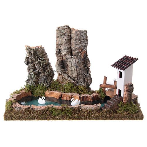 Nativity setting, pond with rocks and swans 1
